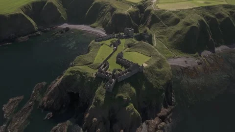 Cinematic Drone View of Dunnottar Castle in Summer Stock Footage 330194744
