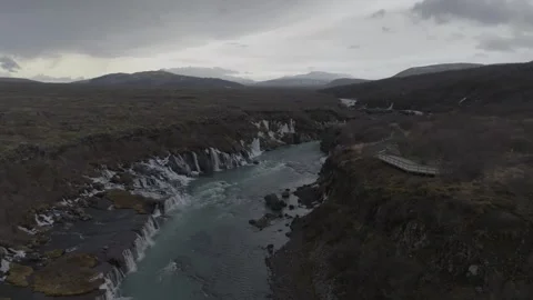 Cinematic drone view of Hraunfossar falls in Iceland Vídeo Stock 332657152