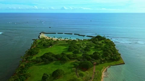 Cinematic drone view of Magic Island lagoon and ocean in Waikiki Oahu 1 Stock Footage 346427313