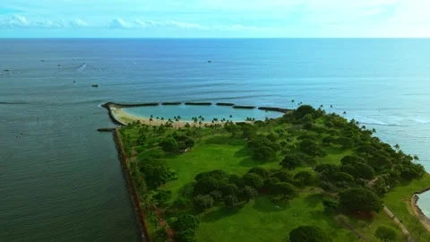 Cinematic drone view of Magic Island lagoon and ocean in Waikiki Oahu 2 Stock Footage 346427340