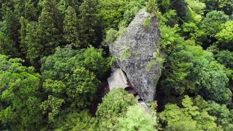 Cinematic Drone View of a Small Shinto Shrine Isolated on Rocky Cliff Stock Footage 336592028