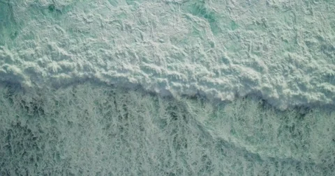 Cinematic Drone View of Waves Flowing Along Tropical Coastline 스톡 동영상 330592113