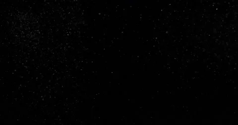 Cinematic dust particles on black screen overlay. Filmed with RED camera in slow Stock Footage 222518849