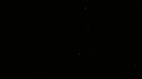 Cinematic Dust Particles | Slow Motion Dust on Dark Background Stock Footage 323505366