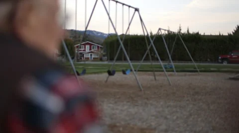 Cinematic Elderly Man and playground Video stock 37345355