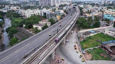 Cinematic epic drone shot of two intersecting metro trains passing above br.. Stock-Footage 344878615