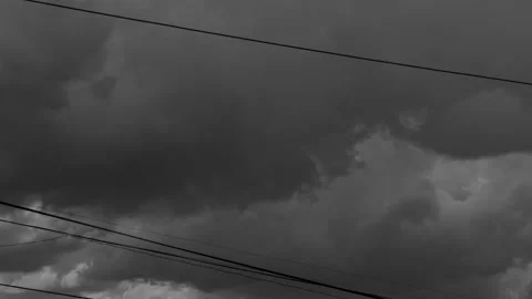 Cinematic featuring massive dark cumulus clouds dramatically cloud cover Stock Footage 336863445