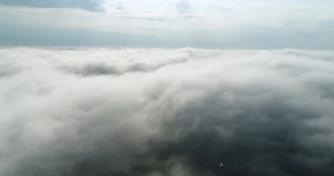 Cinematic flight over the clouds. Stock Footage 100796329