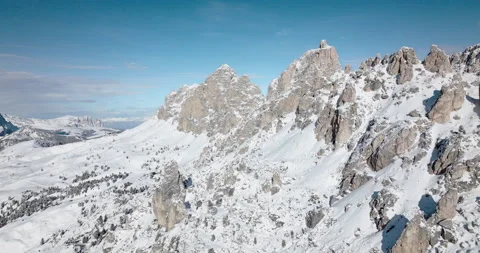 Cinematic flight passing large white mountains 5k Stock Footage 221906797