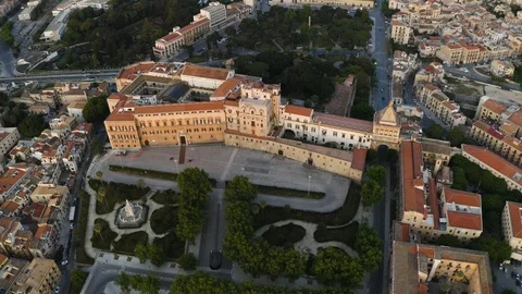 Cinematic flight in the pre-dawn hour over the Palazzo dei Normanni, and Stock Footage 124494358