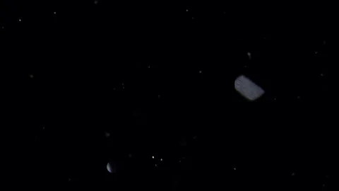 Cinematic Floating Dust Particles on Black Background - 4K Overlay Stock Footage 331947363
