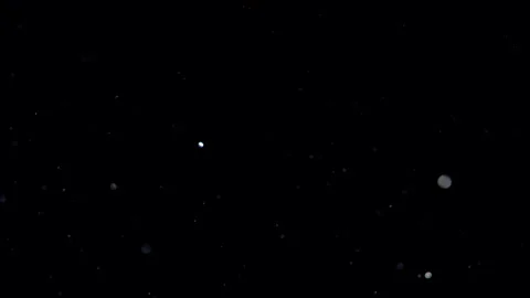 Cinematic Floating Dust Particles on Black Background - 4K Overlay Stock Footage 331947387