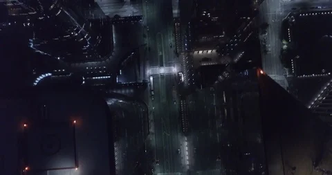 Cinematic flyover empty Downtown streets &amp; Skyscapers - Night Aerial - 4K Stock Footage 117139903