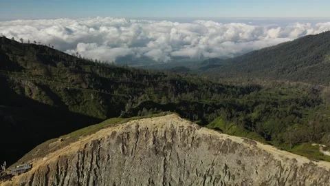 Cinematic Forward Drone Flight Over Ijen Crater and Volcanic Rim Stock Footage 260039478