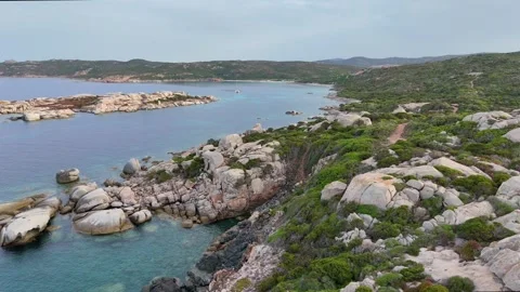 Cinematic Forward Drone Flying Between Rocks Sardegna Coastline Vídeo Stock 333693934