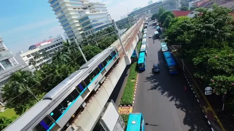 Cinematic FPV Drone Dive High Rise Skyscrapers Street Jakarta Stock Footage 340827111