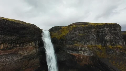 Cinematic FPV drone diving over Haifoss waterfall in Iceland Stock Footage 320293642