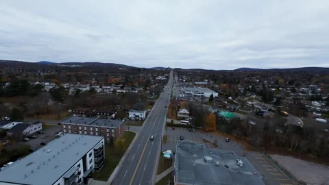 Cinematic fpv drone flight above city road autumn evening original file edition Stock Footage 320375694