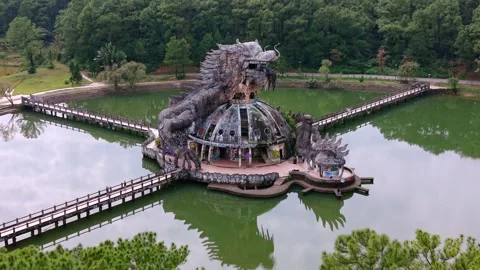 Cinematic FPV drone flight around abandoned dragon water park in Hue, Vietnam Video stock 336638089