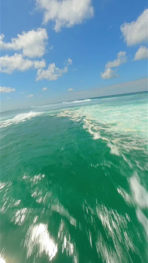 Cinematic FPV drone flight over turquoise ocean waves in Bali, Indonesia Stockbeeldmateriaal 325569834