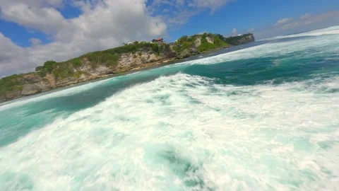 Cinematic FPV drone flight over turquoise ocean waves in Bali, Indonesia Video stock 325569847