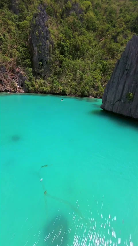Cinematic FPV drone flight over Cadlao Lagoon in El Nido, Palawan, Philippines Stock Footage 339182072
