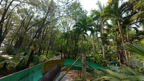 Cinematic FPV Drone Flight Through Abandoned Water Slides in Hue, Vietnam Stock Footage 331427735