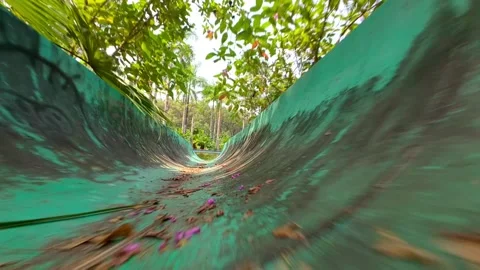 Cinematic FPV Drone Flight Through Abandoned Water Slides in Hue, Vietnam Stock Footage 331427779