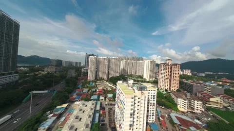 Cinematic FPV Drone Flight Through Urban Residential Skyline in Penang, Malaysia Stock Footage 341311973