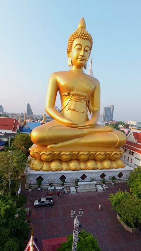 Cinematic FPV drone fly around giant golden Buddha at Wat Paknam temple Bangkok Video stock 336594749