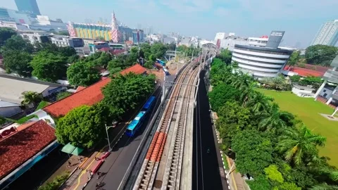 Cinematic FPV Drone Flying Low Over Bus Terminal Road Jakarta Stock Footage 340827117