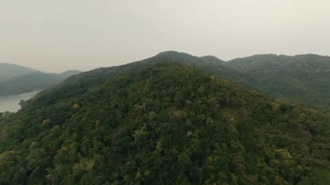 Cinematic FPV Drone Gliding Over Hillside and Executing Split S Dive 库存影片 333143647
