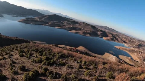 Cinematic FPV Drone Smooth Flight with Snake Island View, Tikvesh Lake. Video stock 330610995