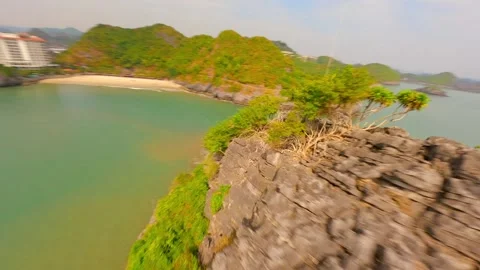 Cinematic FPV Flight Close To Rocky Formations On Cat Ba Island Vietnam Stock Footage 278149151