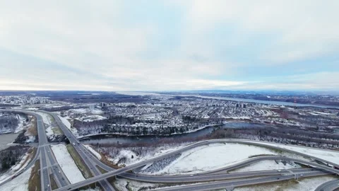 Cinematic fpv winter highway interchange — aerial city traffic view Stock Footage 321433744