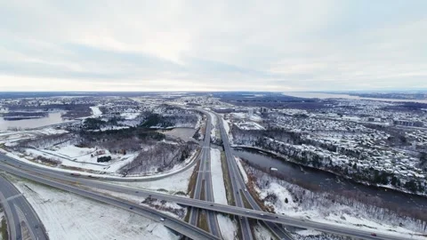Cinematic fpv winter highway interchange — aerial city traffic view Stock Footage 321433765