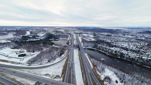 Cinematic fpv winter highway interchange — aerial city traffic view Stock Footage 321433773