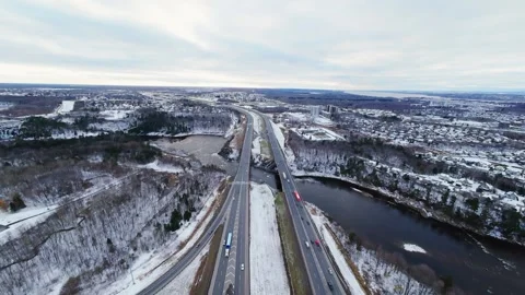 Cinematic fpv winter highway interchange — aerial city traffic view Stock Footage 321433785