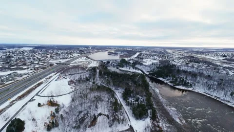 Cinematic fpv winter highway interchange — aerial city traffic view Stock Footage 321433811