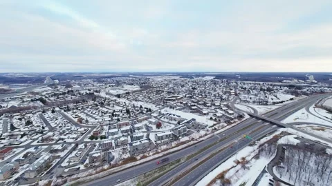 Cinematic fpv winter highway interchange — aerial city traffic view Stock Footage 321433828