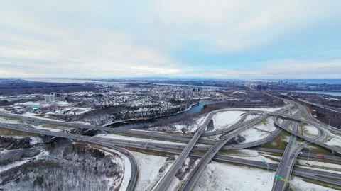 Cinematic fpv winter highway interchange — aerial city traffic view 스톡 동영상 321433849