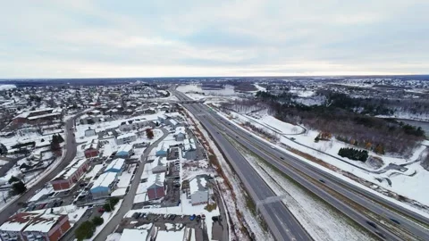 Cinematic fpv winter highway interchange — aerial city traffic view Stock Footage 321434031