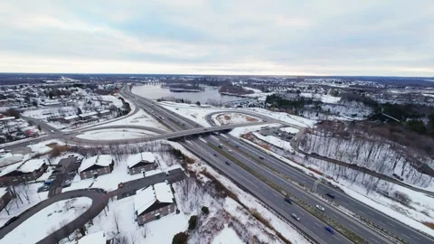 Cinematic fpv winter highway interchange — aerial city traffic view Stock Footage 321434064