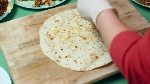Cinematic fresh tomato salsa blended with herbs and garlic in overhead, 4K Stock Footage 341104749