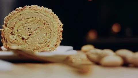 Cinematic garnished dish view: presenting a finished peanut dessert roll Stock Photos