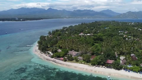 Cinematic Gili Air corner hover with Lombok in background Stock Footage 329588943