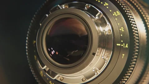 Cinematic glass and mechanical camera lens in slo motion lenses flare Stock Footage 340428685
