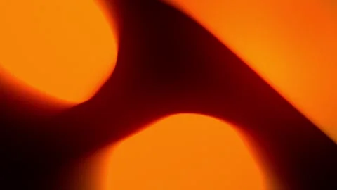 Cinematic Glowing Warm Orange Fluid Gradient Motion Abstract Background. 4K Видео 337477423