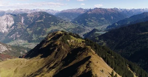 Cinematic green alpine mountain summit peak sunny summer day. Austria. Drone fly Video stock 80922770