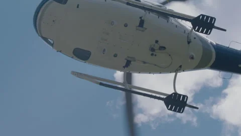 Cinematic Helicopter Taking Off, Above The Camera, Slow Motion Stock Footage 247164923